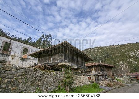 Lastres, Asturias, Spain: January 2016: Old Stone Architecture And Tower Clock  In Lastres, Sailor C