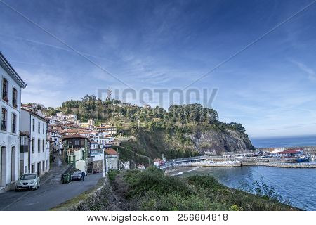 Lastres, Asturias, Spain: January 2016: Old Stone Architecture And Tower Clock  In Lastres, Sailor C