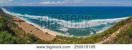 Top Aerial View Of Beauty Bali Beach. Empty Paradise Beach, Blue Sea Waves In Bali Island, Indonesia