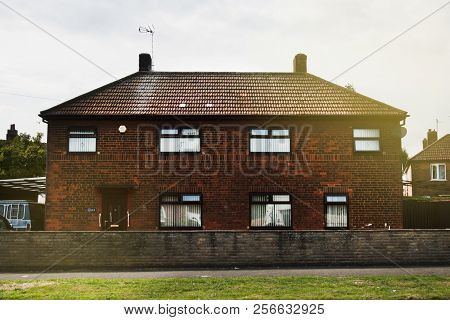 Corby, United Kingdom - September, 01, 2018: Typical English House, Orange Brick Homes. Copy Space.