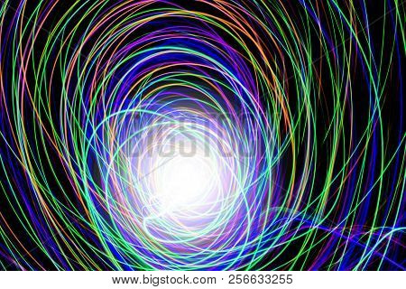 Multi Color Light Painting, Long Exposure Photography, Abstract Lines Of Color Against A Black Backg