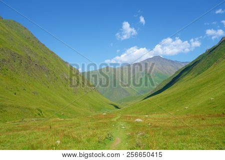 Grand Alpine Mountain Range During Summer On A Hiking Trail Leading From Juta To Chaukhi Pass, Cauca