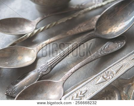 Close Up Shot Of Silver Utensil Cutlery Spoons On Tray