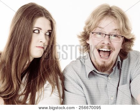 Woman Being Irritated Looking Displeased At Her Friend Or Boyfriend Being Silly, Fooling Around And 