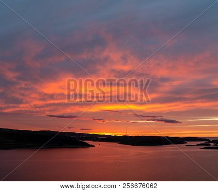 Colorful Dramatic Play Of Light And Shadows At The Sunset Over The Kola Peninsula And Barents Sea, R