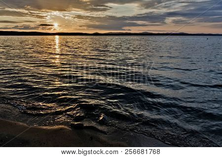Golden Sun Sinks Over The Lake In The Evening, Golden Water, South Ural Lake Uvildy