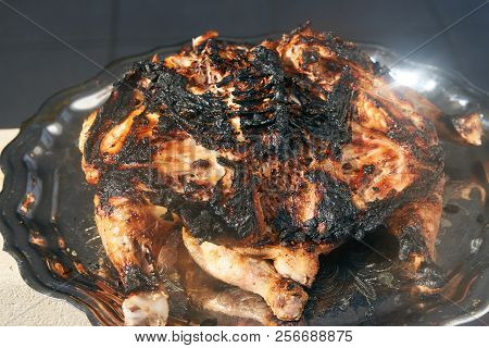 Grilled Chicken Tabaka On The Flaming Grill