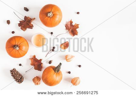 Autumn Composition. Pumpkins, Candles, Dried Leaves On White Background. Autumn, Fall, Halloween Con