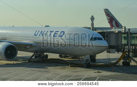 Passenger Airplane Docking At The Airport