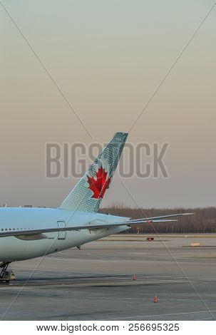 Passenger Airplane Docking At The Airport