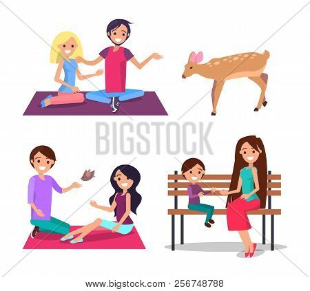Man And Woman Sitting On Blanket And Feeding Deer And Bird From Hand, Smiling People Communicating W