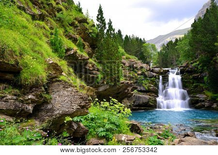 Waterfall in Ordesa and Monte Perdido National Park.  Pyrenees mountain. Province of Huesca, Spain.