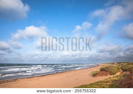 Deserted beach and choppy seas, Thunder Cove, Prince Edward Island, Canada.