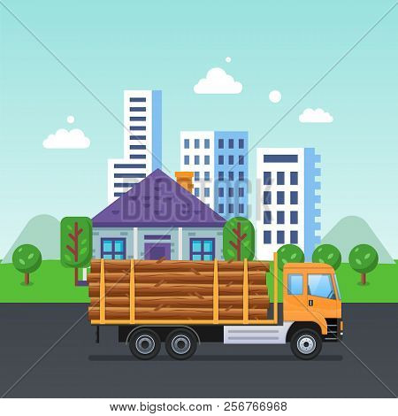 Truck With Wooden Logs In Trunk, Rides Along Asphalt Road.