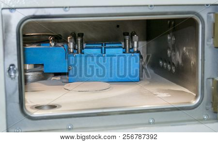 Object Printed On Metal 3d Printer, Laser Sintering Machine For Metal Close-up.