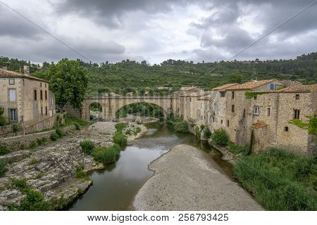 Old Stone Bridge In Lagrasse In Languedoc, France