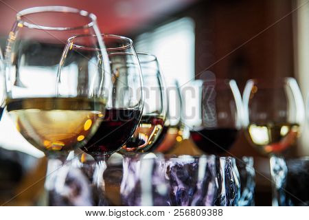 Glasses With Alcoholic Drinks In A Restaurant