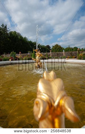 Baroque Fountain In The Garden Or A Royal Palace In The Netherlands. Greek Sculp Hours And Fantasy A