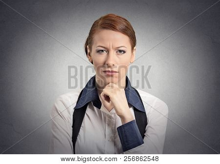Skeptic Doubtful Woman Looking At You Camera Isolated Grey Wall Background. Negative Human Emotion F