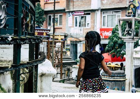 Kathmandu Nepal August 24, 2018 View Of A Nepali Child Playing Around The Shree Gha Stupa Temple Loc