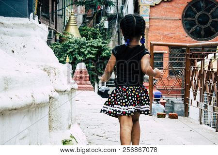Kathmandu Nepal August 24, 2018 View Of A Nepali Child Playing Around The Shree Gha Stupa Temple Loc