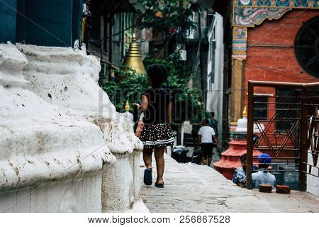 Kathmandu Nepal August 24, 2018 View Of A Nepali Child Playing Around The Shree Gha Stupa Temple Loc
