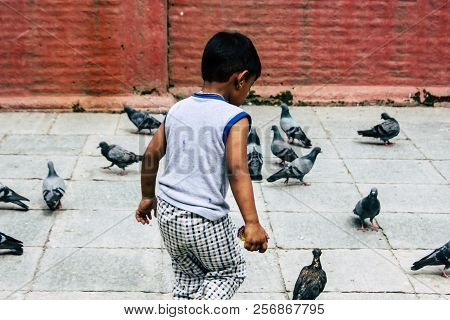 Kathmandu Nepal August 24, 2018 View Of A Nepali Child Playing Around The Shree Gha Stupa Temple Loc