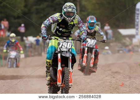 ST. PETERSBURG, RUSSIA - SEPTEMBER 2, 2018: Athletes compete in third stage of Russian Supercross Championship. This stage is held on the motor racing track of DOSAAF in Saint Petersburg