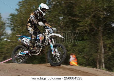 ST. PETERSBURG, RUSSIA - SEPTEMBER 2, 2018: Athletes compete in third stage of Russian Supercross Championship. This stage is held on the motor racing track of DOSAAF in Saint Petersburg