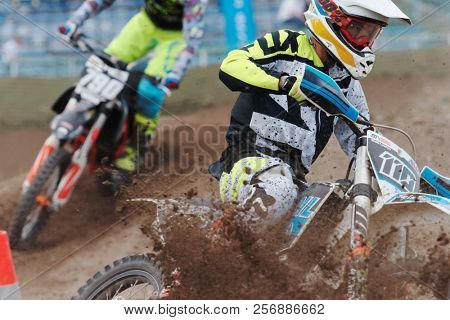 ST. PETERSBURG, RUSSIA - SEPTEMBER 2, 2018: Athletes compete in third stage of Russian Supercross Championship. This stage is held on the motor racing track of DOSAAF in Saint Petersburg