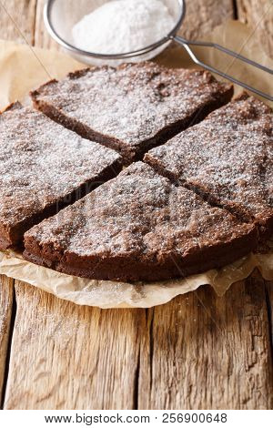 Delicious Freshly Baked Swedish Chocolate Cake Sliced Close-up. Vertical