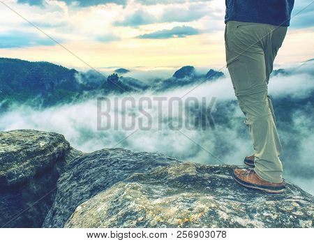Trekking Shoe And Legs On Rocky Hiking Trail In Mountains Motivation Inspiration Concept. Outdoors A