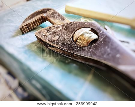 Aged Teethy Wrench. Repairing Work Utensil. Renovation Concept