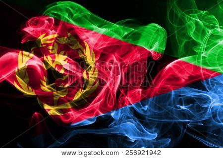 National Flag Of Eritrea Made From Colored Smoke Isolated On Black Background