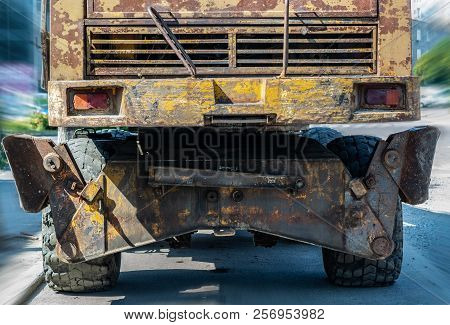 Old Battered Excavator Rear View In The Day