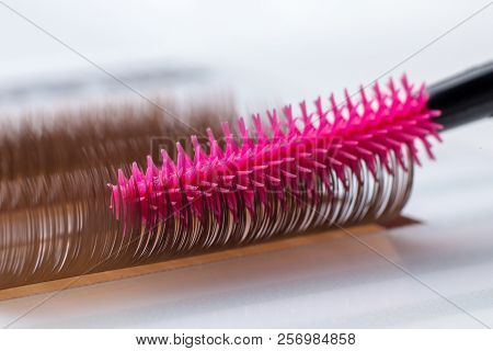Eyelash Brown Extension Procedure. Set Lashes Close Up Pink Comb