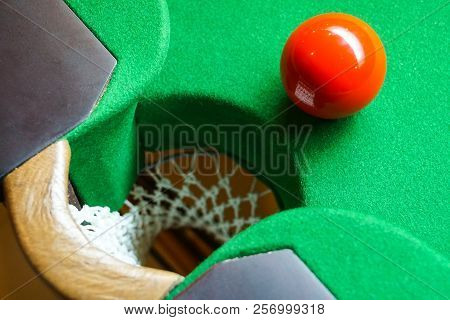 Red Snooker Ball On The Snooker Table