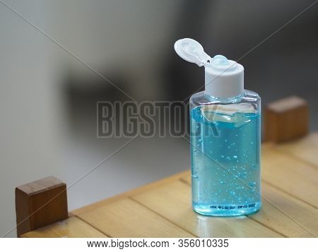 Hand Wash Gel In Plastic Bottle On Wooden Desk, Clean To Prevent Germs Protect Colona Virus, Covid 1