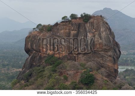 Sigiriya Or Sinhagiri Is An Ancient Rock Fortress Located In The Northern Matale District Near The T