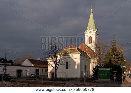 Vienna, Austria - March 8, 2020: The Church Of Jedlesee (vienna, Austria) On A Cloudy Morning In Ear