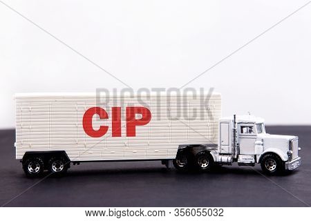 Cip Word Concept Written On Board A Lorry Trailer On A Dark Table And Light Background