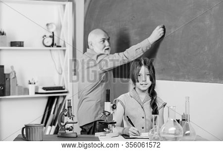 Expand Your Mind. School Lesson. Good Pedagogue Friendly Kind. Little Girl With Man Tutor Study Scie