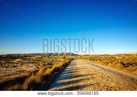 Bardenas Reales is a Spanish natural park of wild beauty, it is a semi-desert landscape in which erosion has carved whimsical shapes to create almost lunar effects with badlands and lonely hills