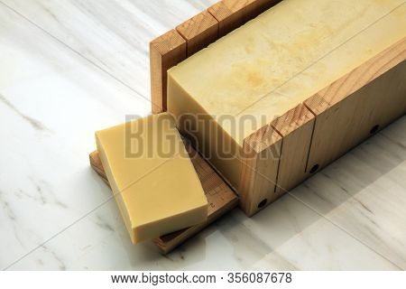 Display Of A Variety Of Soaps On Linen Background