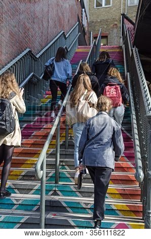 Croydon, Uk - October 2, 2019: A Group Of Teenage Girls Walking Up Some Colourful Steps In Croydon, 