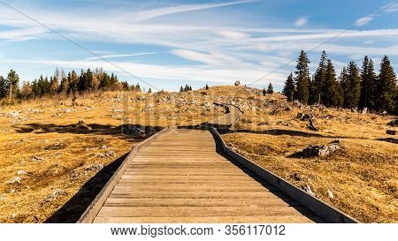 Wooden Path At The Top Of Schockl Mountain In Graz Austria Leading To View Point. Mountain Andscape