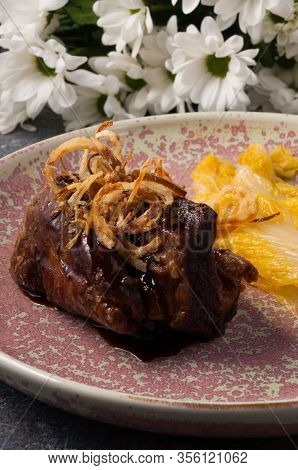 Beef Cheek With Lettuce And Fried Onions. Vertical Frame