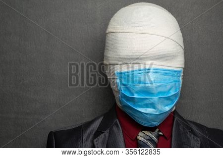 Incognito Man In A Medical Mask Is Dressed In A Business Suit
