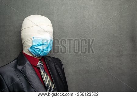 Incognito Man In A Medical Mask Is Dressed In A Business Suit