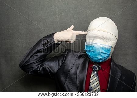 Incognito Man In A Medical Mask Is Dressed In A Business Suit
